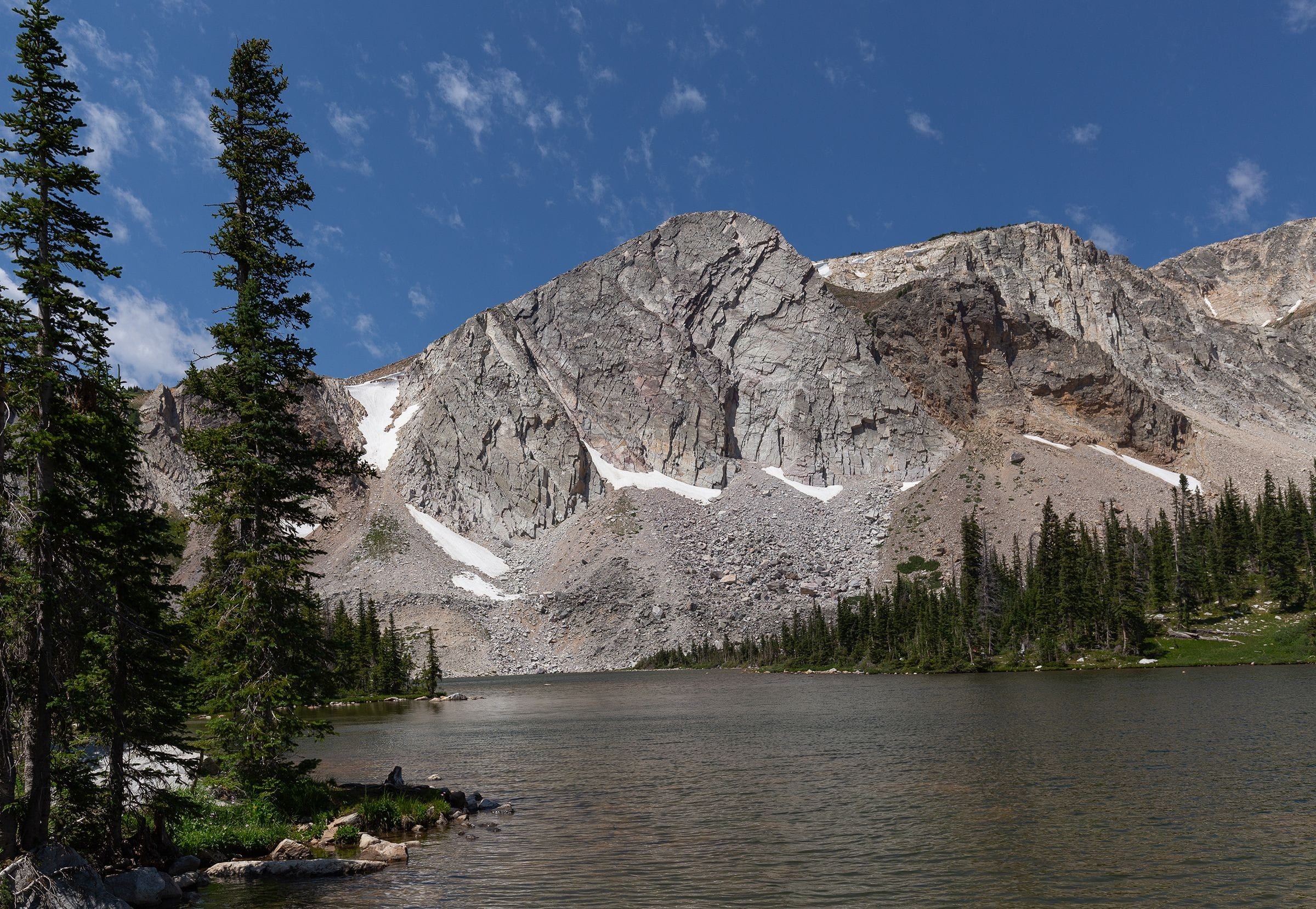 Lake Marie in July. Super clear air, water and sky. For scale, look for the hikers on the opposite bank of the lake. 28 July 2016